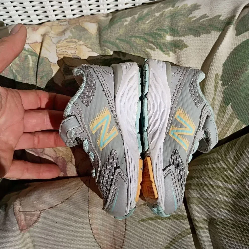 2 pairs of baby/toddler sneakers - Nike, New Balance